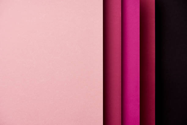 istock Pattern of overlapping paper sheets in pink tones 1004746014