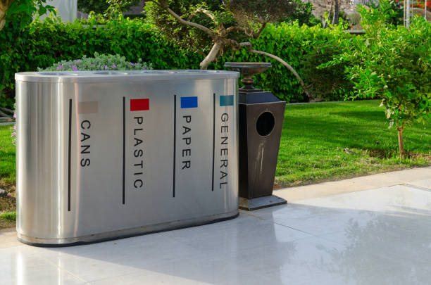 istock Container for separate collection of garbage and urn with ashtray on street 1004751764