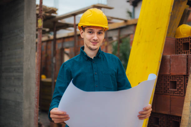 istock Portrait of construction engineer on building site 1004753206