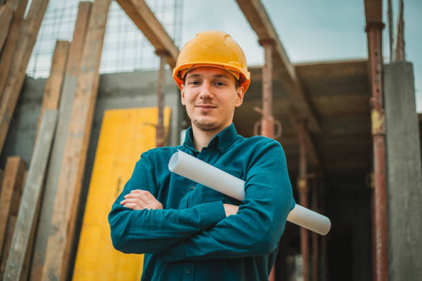 istock Portrait of construction engineer on building site 1004753726