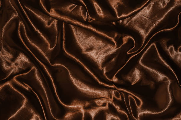 istock Background and wallpaper by brown fabric and stripe textile 1004778608