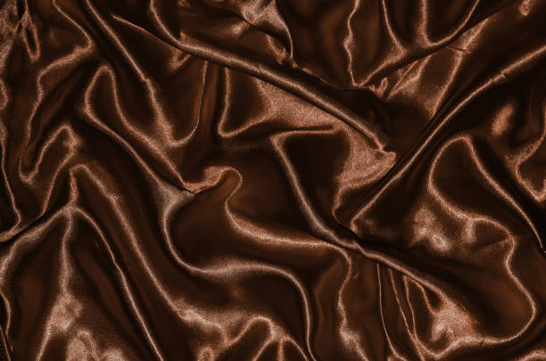istock Background and wallpaper by brown fabric and stripe textile 1004778816