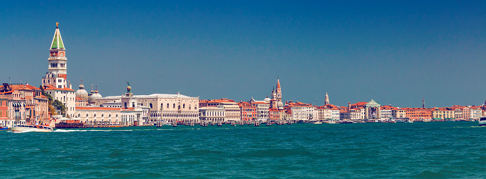Panorama of Grand canal coast line with a lot of colorful houses, Doge palace and San Marko square in Venice, Italy