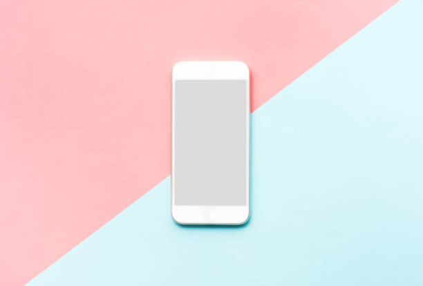 istock Smartphone,white mobile phone on colorful background.flat lay minimal style 1004782278