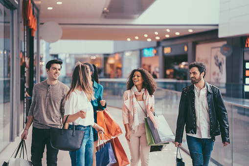 Friends spending the weekend in the shopping mall