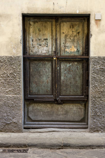 istock wooden doors in a historic old building 1004821780