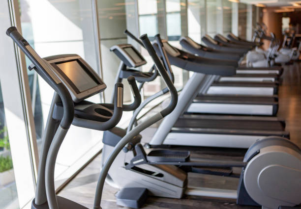 istock Exercising machines in health club 1004821872