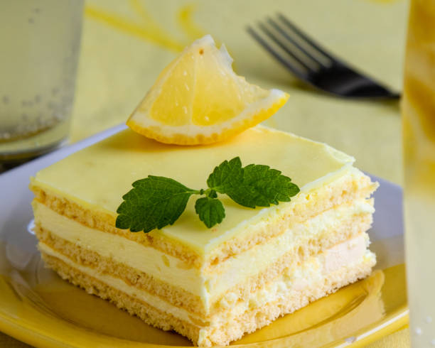 istock fresh tasty sweet lemon cake dessert with mint 1004824000