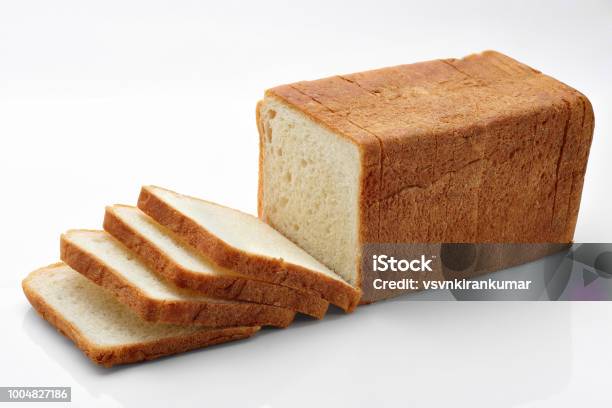 Sliced Bread On White Stock Photo - Download Image Now - Bread, Loaf of Bread, White Bread