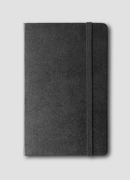 black closed notebook isolated on grey black closed notebook mockup isolated on grey moleskin stock pictures, royalty-free photos & images