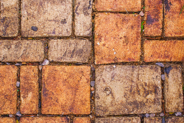 istock Abstract image : Top view of stone bricks sorted in walkway or footpath. 1004836116