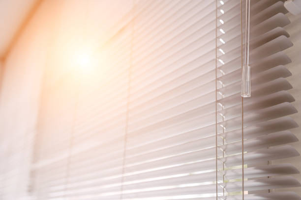 istock Blinds of sunlight come through the house. 1004842496