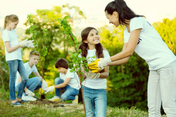 istock Charming kid listening to her tutor 1004853488