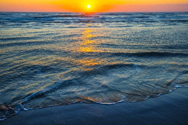 istock quiet sea coast at the early morning 1004856640