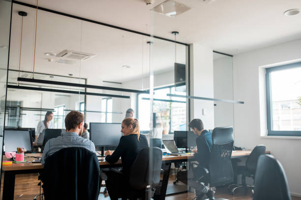 istock Group of businesspeople working together in the office 1004862248
