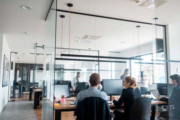 istock Businesspeople working together in the office 1004862260