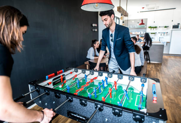 istock Two men taking a break and playing hand football during a break 1004862326