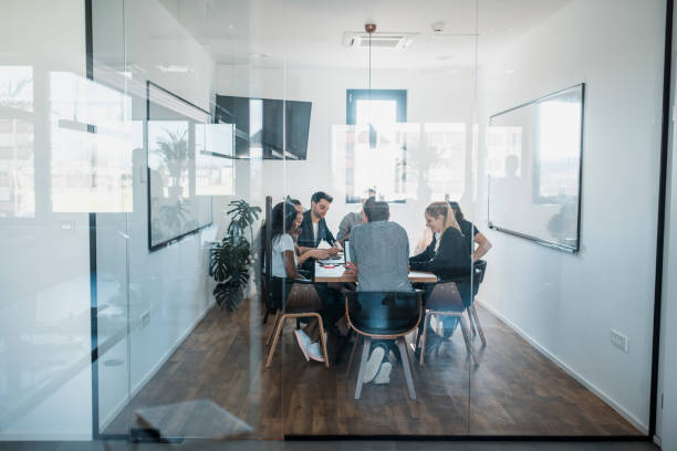 istock Business colleagues brainstorming new ideas in the board room 1004862364