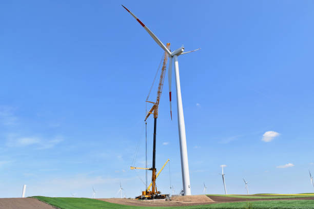 istock Construction of windfarm in eastern Europe 1004865194