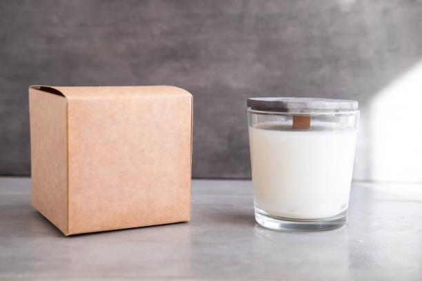 Concrete scented soy round candle on grey table