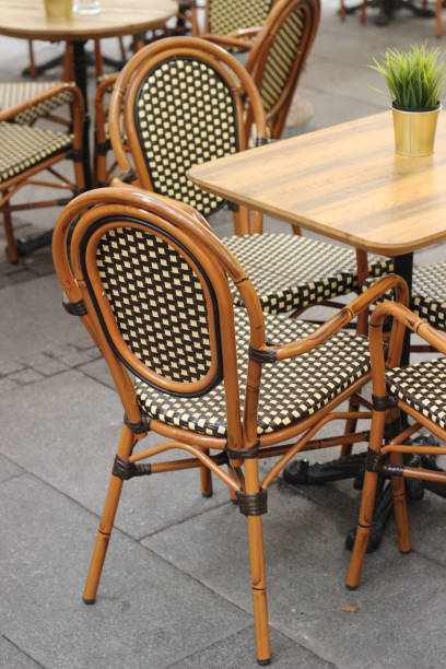 istock Wooden cafe outdoors chairs 1004906052