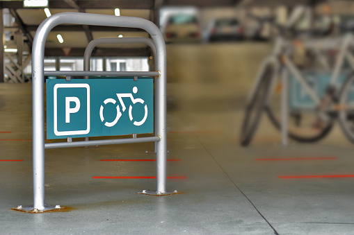 Parking sign for parking lot for bicyclettes with tools for wheels in Belgrade, Serbia