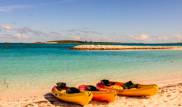istock Kayaks on the luxury beach oasis in Coco Cay. 1004923142