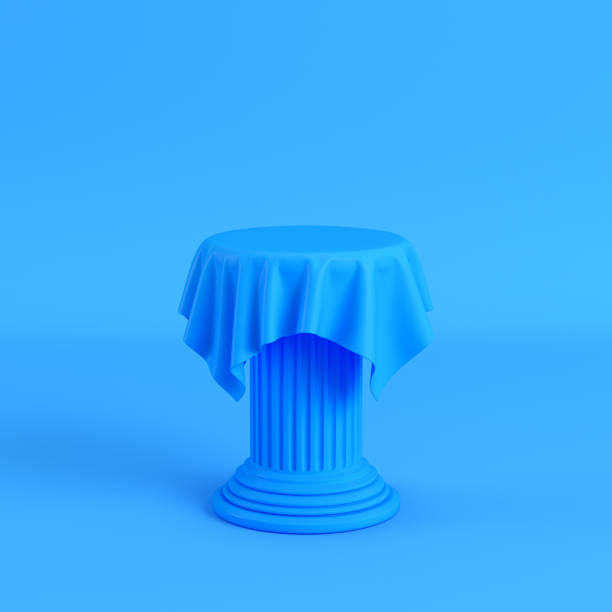 istock Cloth on a pedestal on bright blue background 1004923584