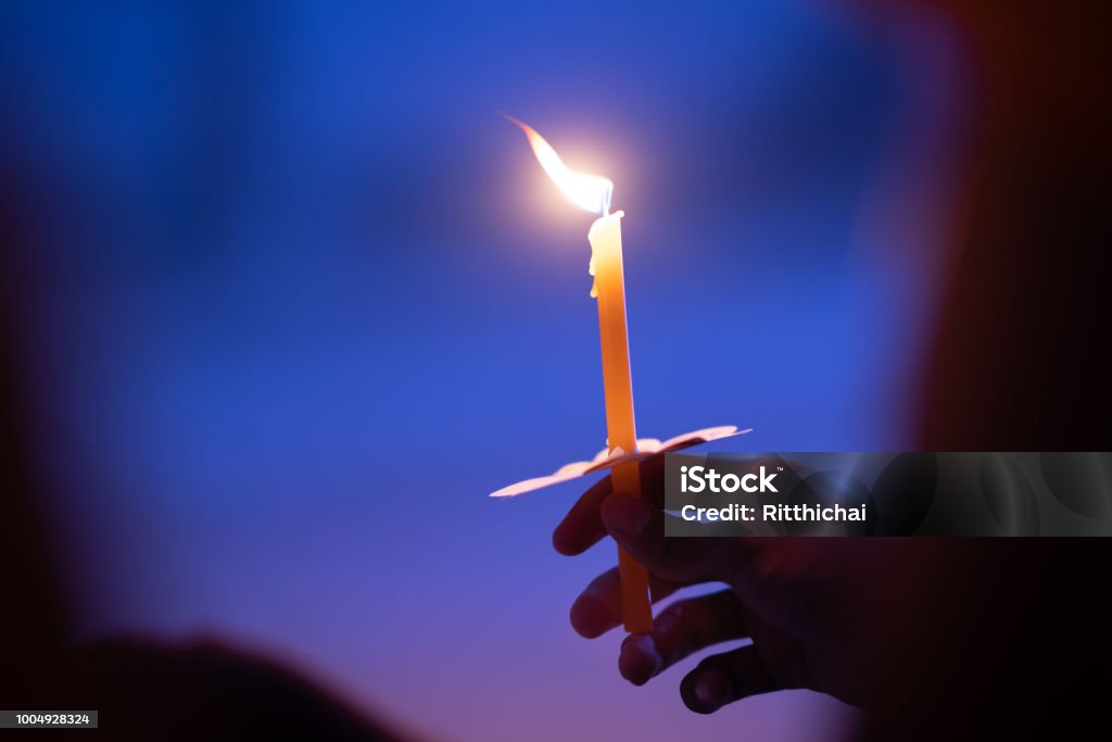 Light candle buring in celebration and spirit meditation Candle Stock Photo