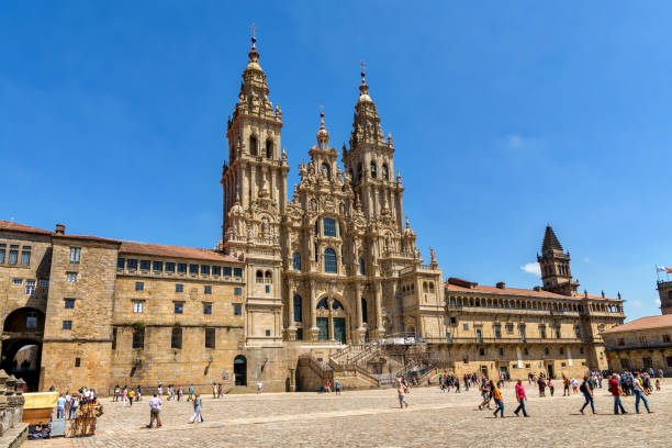 Tourists and pilgrims visit Santiago de Compostela cathedral. stock photo