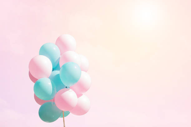 istock Bunch of flying balloons on soft background 1004961302