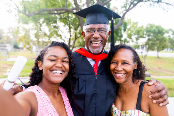 istock Senior Black Man Graduate with Family 1005011802