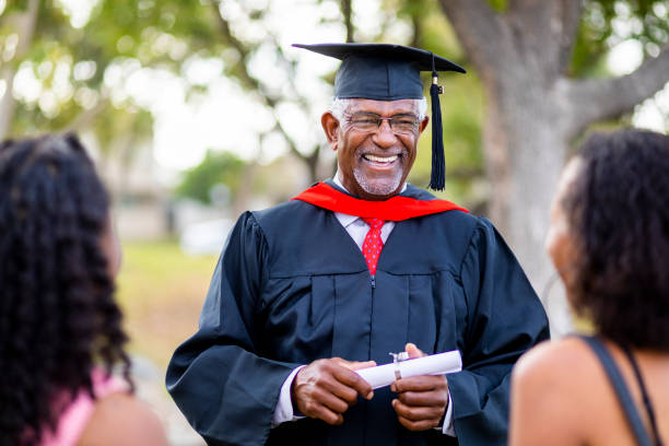 istock Senior Black Man Graduate with Family 1005011806