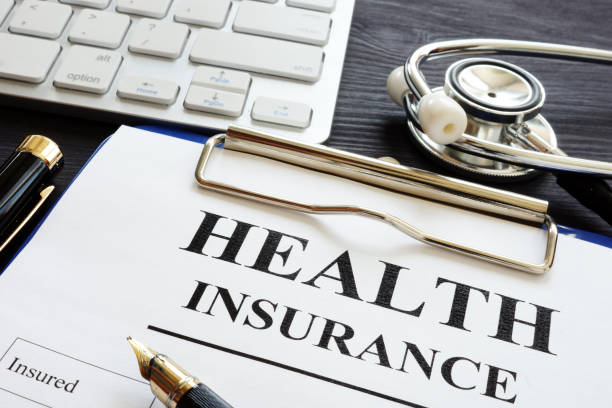 Individual health insurance policy and stethoscope. Individual health insurance policy and stethoscope. health insurance stock pictures, royalty-free photos & images