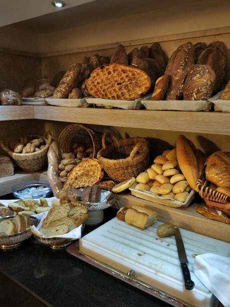 istock Freshly baked bread on bakery shelves 1005023686