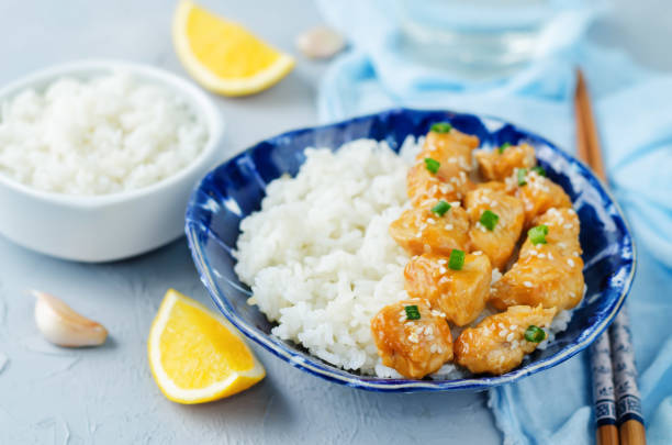 istock Orange glaze chicken with rice 1005026528