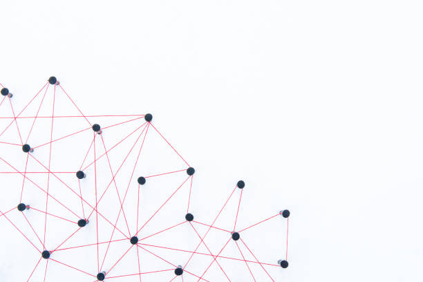 istock Connecting networks concept - network connected with yarn red on white paper with copy space. Simulator connection social media, internet, people communication, Linking entities 1005048426