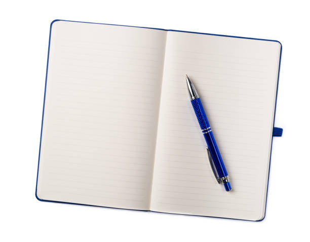 istock An open blue pad with a pen isolated on a white background. 1005048540