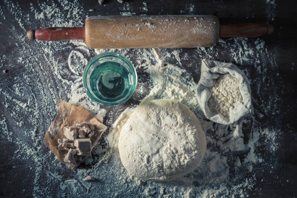 istock Top view of preparation for baking homemade dough for pizza 1005053430