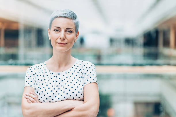 istock Confident businesswoman inside office building 1005062348