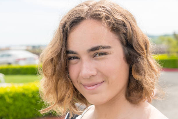 istock Smiling young woman looking at the camera 1005068720
