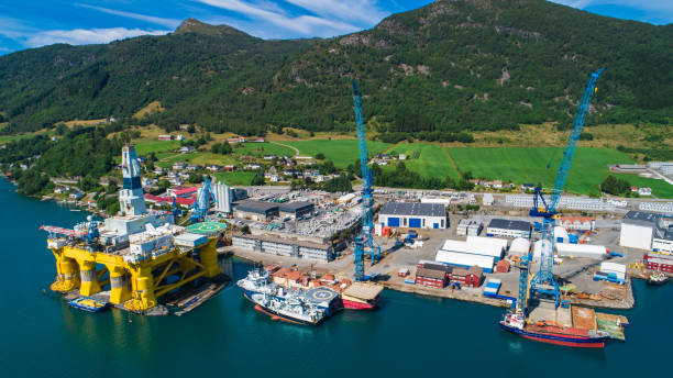 istock Oil rigs under maintenance near Olen, Norway. 1005071110
