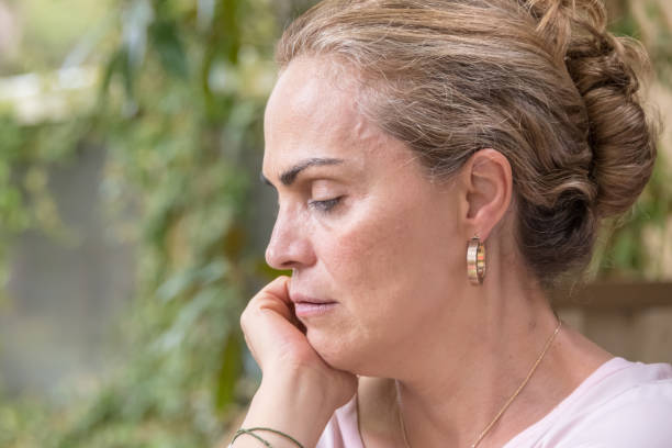istock Sad pensive mature woman 1005073664