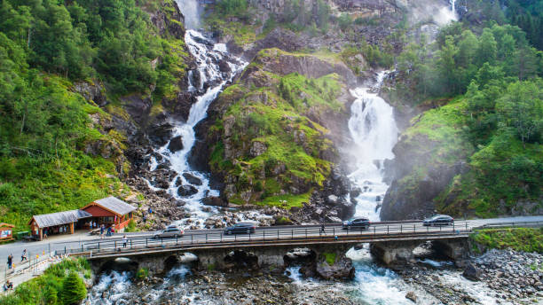 aerial view of latefossen. a waterfall located in the municipality of odda in hordaland county, norway. - bridge norway odda falling imagens e fotografias de stock