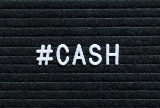 istock Hashtag word #cash written on the letter board. 1005088500