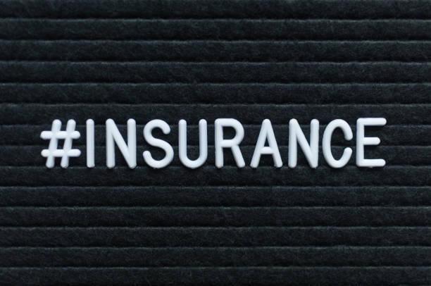istock Hashtag word #insurance written on the letter board. 1005088522