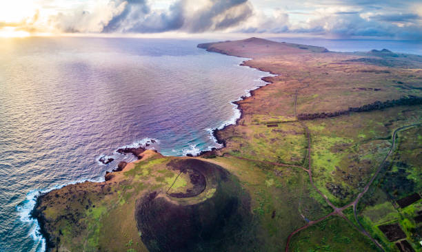 Ovahe Beach from the air, an aerial view of the most famous beach at Easter Island and maybe the best one in Chile Easter Island a mystic place in the middle of the Pacific Ocean, maybe the most remote area in the world if we take onto consideration the distance to the mainland, Moais standing facing the elements and remembering and old amazing culture easter island stock pictures, royalty-free photos & images