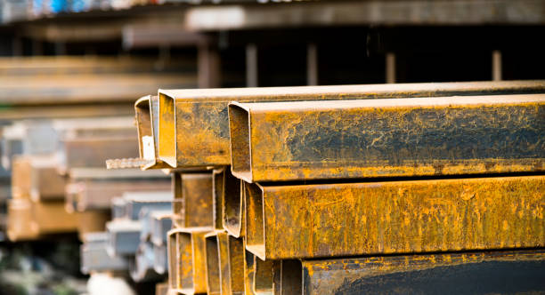istock Rusty square steel tubes on the shelf 1005206988