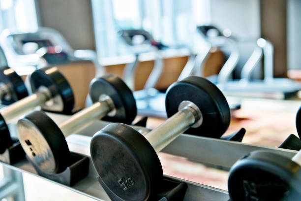 istock Dumbbells in a row at gym 1005214172