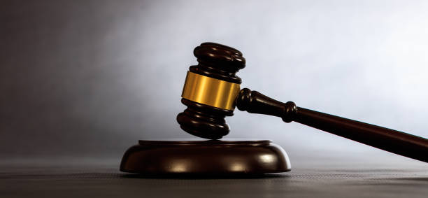 istock Law or auction gavel on a dark background 1005216580